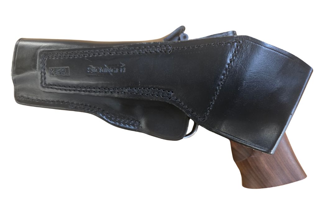 gebr. SMITH & WESSON Mod. 66-2, Lauflänge 4" mit Holzgriff und zusätzlich ein Holzgriff mit Einlagen und Sickinger Lederholster, Zustand: Gut