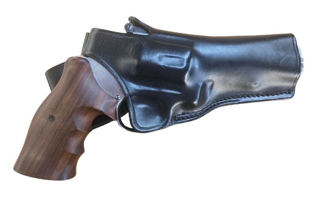 gebr. SMITH & WESSON Mod. 66-2, Lauflänge 4" mit Holzgriff und zusätzlich ein Holzgriff mit Einlagen und Sickinger Lederholster, Zustand: Gut