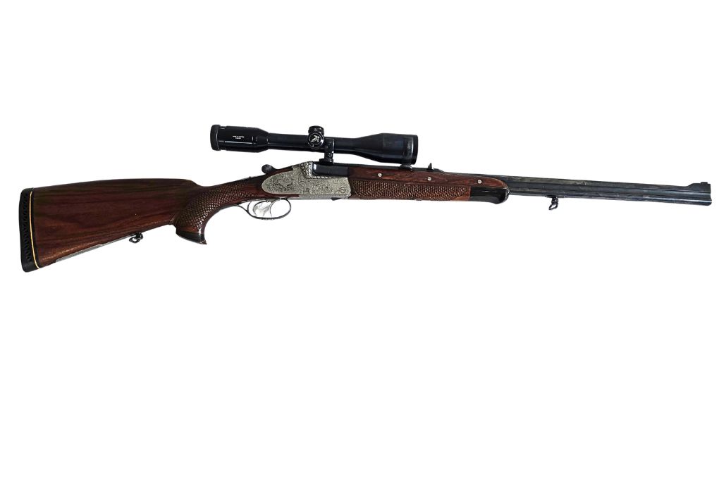 gebr. SODIA Bergstutzen mit lg. Seitenplatten und Schaftmagazin und montiertem SWAROVSKI Habicht 6x42S Abs. 7A, Zustand: Gut Kal. 5,6x50RMag.