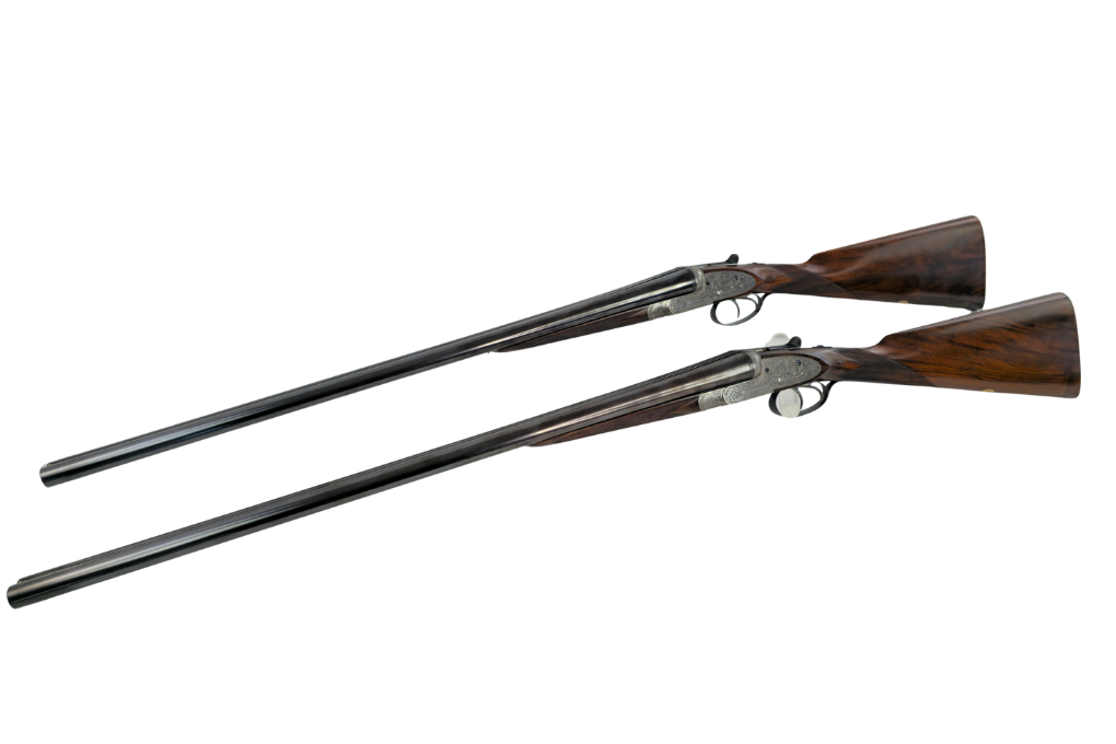 gebr. WILLIAM EVANS Ltd. of London, Doppelflinten-Paar Nr. 1 & 2 mit Holland&Holland Seitenschlösser, Doppelabzug mit Ejektor, LL71cm mit Fixchoke im Lederkoffer mit Zubehör, Zustand: Sehr gut