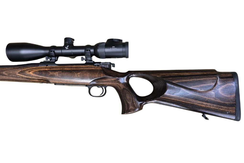 gebr. MAUSER M12 Lochschaft mit STALON Schalldämpfer mit orig. SM montiertes SWAROVSKI Z6i 2-12x50L mit Ballistikturm, Abs. 4A-I, Zustand: Neuwertig - NPR: € 6.378,00