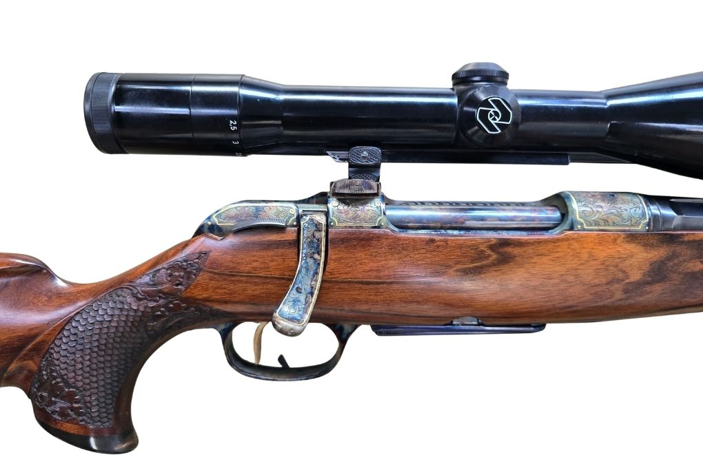 gebr. KRICO Sondermodell, Matchabzug, Achtkantlauf, graviertes System, Montage und Abzugsbügel mit Goldfaden, Ferlacher Schäftung und mit SEM montiertes ZEISS Diavari-Z 2,5-10x52ZM Abs. 4, Zustand: Sehr gut